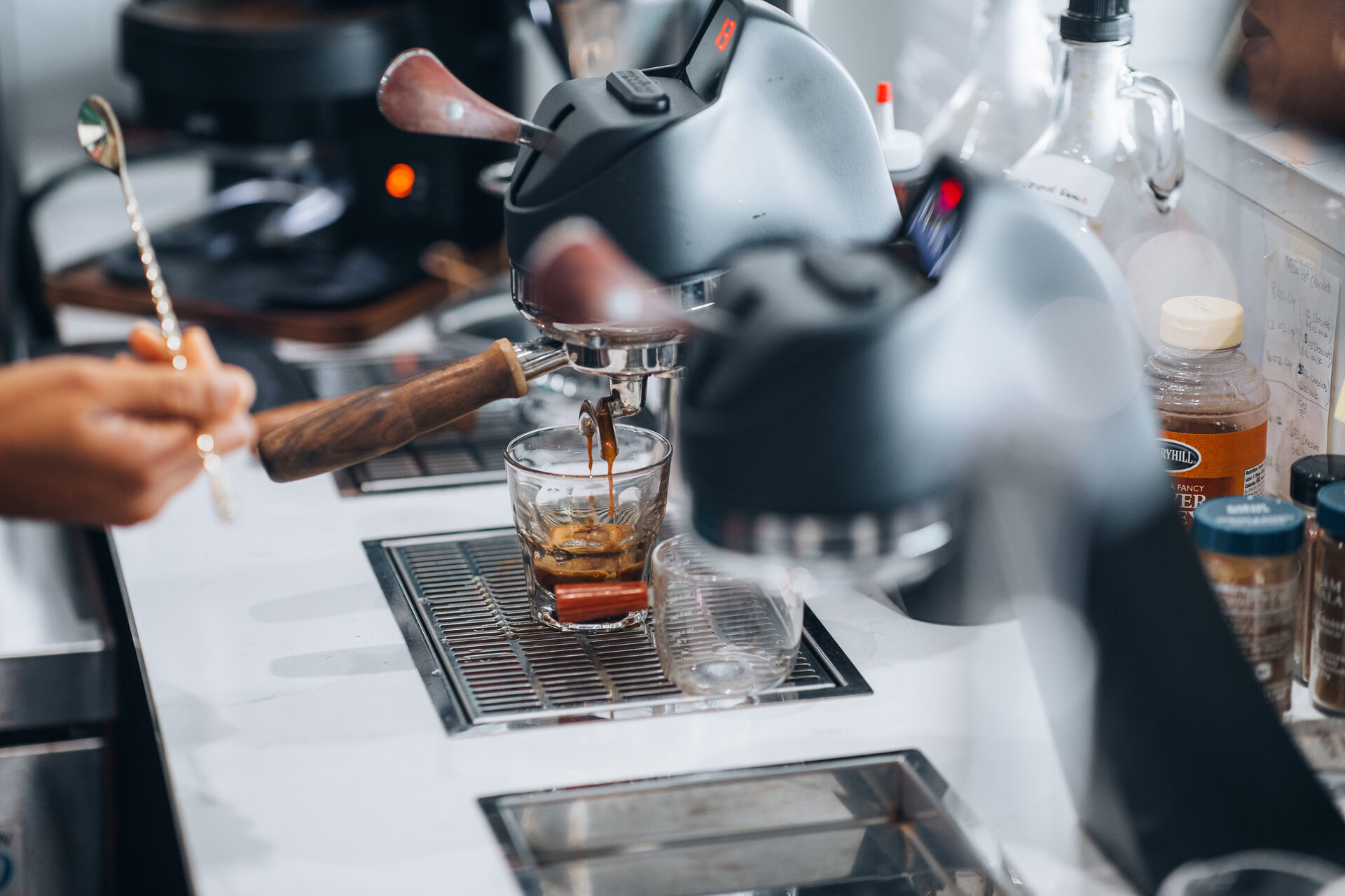 Barista pulling espresso